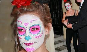 Kate Hudson makes unsteady exit from Halloween bash in Mexican mask