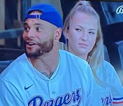 Dak Prescott at the Rangers game rooting for the Texas Rangers.