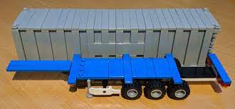 The ramps can be lowered and any self propelled load can enter the trailers deck. 40 Gooseneck Trailer Lego