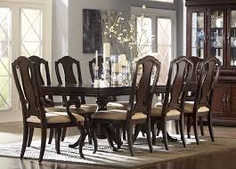The dining room table and chairs are supposed to be wood but there is a nick in the wood and it certainly doesn't seem like wood at all. Dining Room Table Chairs Haverty S Orleans Dining Room Furniture Cheap Dining Room Sets Dining Room Decor Traditional