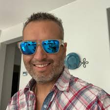 Beautiful corner curio cabinet with 5 glass shelves and lights.