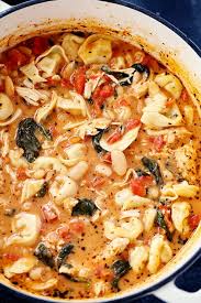 Creamy Tuscan Garlic Tortellini Soup Is So Easy To Make And One Of The Best Soups That You Will Make Tortellini Dic Delicious Soup Recipes Garlic Tortellini