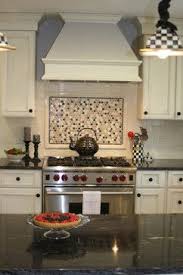 Black And White Spanish Tile Backsplash Pin By Elaine Yu On Ideas For The House Backsplash Tile Design Stove Backsplash Traditional Kitchen