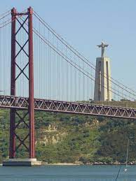 The ponte 25 de abril, or the april 25th bridge, spans the tagus river and connects the city of lisbon on the north side with the city of almada on the south. 25th April Bridge Lisbon Portugal Ponte 25 De Abril Imagens De Lisboa Lisboa Portugal