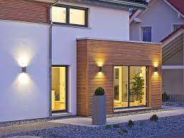 house future exterior with lighting prefab weiss plus energy house energy exterior house entrance house lighting outdoor outside lights on house