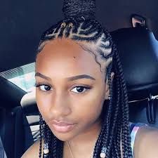 Two main braids were created on each side and connected in the center at the back of the head while the crown of the head is now here's a black braided hairstyle that will satisfy even the most selective of men. Top Braids Look You Must Rock Back To School Hair Styles African Braids Hairstyles Cornrow Hairstyles