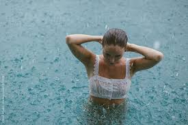 Woman In A Pool Swimming In The Rain By Cloud Studio For Stocksy United Rain Photography Beach Photoshoot Photoshoot