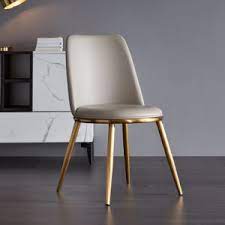 Down below, four tapered dowel legs provide support. China Contemporary Dining Room Chair Stainless Steel Legs Upholstered Dining Chair China Dining Chair Dining Table Set