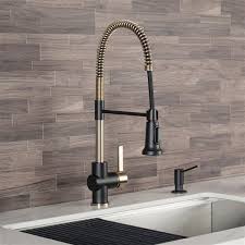 Many homes desirous of looking luxurious and refined opt for this fixture when doing a kitchen makeover. Kraus Britt Pull Down Kitchen Faucet Single Handle Brushed Gold Matte Black Lowe S Canada