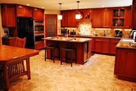 Cherry cabinets with black granite idea for backsplash cherry. Traditional Cherry Kitchen With Copper Accents Black Appliances And Mosaic Tile Kitchen Cherry Kitchen Kitchen With Copper Accents