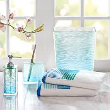This elegantly designed bathroom set includes an unusual and quite beautiful square soap dish, a liquid soap/lotion dispenser, a toothbrush holder, tissue box cover, a clear glass tumbler in a patterned stand and a wastebasket. Madison Park Seaglass Bath Accessory 5 Piece Set Overstock 8111194