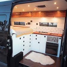 Charming Modern Camper Van With Black And White Interior With Wood Accents And W Kastenwagen In Wohnmobil Umbau Wohnmobil Umbau Wohnwagen Renovierung