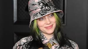Billie is typically known for bright neon shades and oversize sweatsuits, but this photo shoot proved her style evolution is reaching new heights. Billie Eilish Poses For Vogue In Lingerie
