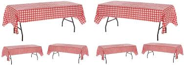 The tables are covered in red and white checkered tablecloths and the plates of spaghetti and. Amazon Com Pack Of 6 Plastic Red And White Checkered Tablecloths 6 Pack Picnic Table Covers By Oojami Kitchen Dining
