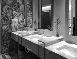 At the point when individuals go to a restaurant, it isn't only the menu or the administration that they notice. Interior Design Of Public Wash Basin And Automatic Faucet In Modern Hotel Or Restaurant Black And White Tone Stock Photo Picture And Royalty Free Image Image 90810974