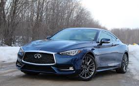 Personal luxury that steers like a video game. 2017 Infiniti Q60 Red Sport 400 Mean But Not Angry The Car Guide