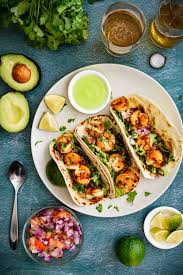 Mix together the lime juice and zest with greek yogurt and mayo or sour cream, hot sauce, garlic powder, and salt. Shrimp Tacos With Avocado Yogurt Sauce Pepper Delight