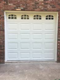 Installation of garage door windows offers aesthetic and financial benefits. Raised Panel By C H I Overhead Doors