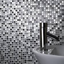 The slate silver square glass mosaic is a wonderful glass mosaic for creating a textured modern look on either your bathroom or kitchen walls. Verona Sparkle Chrome Silver Glass Metal Mosaic 15x15mm G30074 The Cornwall Tile Company