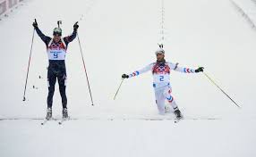 Martin Fourcade Of France Stretches For The Finish Line Next To Emil Hegle Svendsen Of Norway During The Men S 15 Km Mass Start C Sochi Olympics Paralympics
