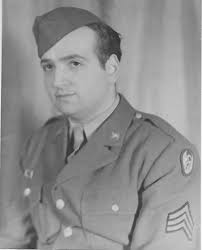 Merry Christmas and Happy New Year! 🎄❤️ Christmas at the 385th BG.  Photograph of a bomb crew gathered around a bomb. There is a message  painted