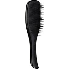 Over time, your brush may get stray hairs and debris buildup in between the bristles. Tangle Teezer Wet Detangling Hairbrush Black