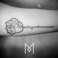 There are generally two lines of tattooing on the back, these converging downwards from either shoulder like the seams of a jacket towards the spine and the. 15 Single Line Tattoos That Are Simply Beautiful Line Tattoos Geometric Rose Tattoo Mo Ganji