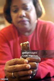 218 Holding Candy Bar Stock Photos, High-Res Pictures, and Images