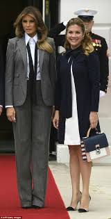 First lady of the united states melania trump, 49, and canadian prime minister justin trudeau, 47, were at the center of online gossip after this somewhat steamy smooch was captured in a split second. Melania Trump Wore An Undone Tie To Meet Justin Trudeau Trump Fashion Milania Trump Style First Lady Melania Trump