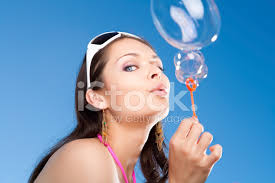 Maybe you would like to learn more about one of these? Young Woman Blowing Bubbles Against Blue Sky Stock Photos Freeimages Com