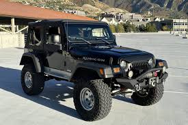 Image result for Brilliant Black 2003 Jeep