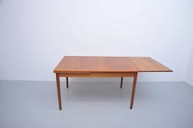 We also carry a couple of teak folding tables that might be just right for a boat or a condo balcony. Mid Century Teak Dining Table By Kaj Winding For Sale At Pamono