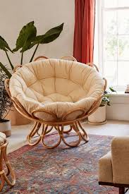 While the bed in a guest room may only see occasional use, you can put the area around it to work as everyday storage. Flora Rattan Papasan Chair Papasan Chair Apartment Decor Bedroom Decor