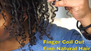 Then — piece by piece — twirl your hair around your finger. How To Create Finger Coils For Ultimate Hair Definition