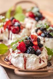Pavlova is crisp on the edges, chewy on top, and marshmallow soft and creamy in the centers. Mini Pavlova Recipe Meringue Dessert The Cookie Rookie