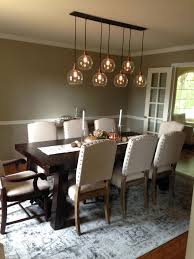 This means that your options are almost unlimited. Begin By Choosing A Chandelier Or Other Low Hanging Lights To Mainly Illuminate Pendant Lighting Dining Room Dining Room Light Fixtures Dining Room Chandelier