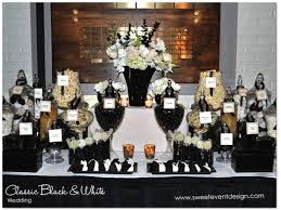Black And Gold Candy Buffet How To Set The Wedding Candy Buffet Weddingelation Black Candy Buffet Candy Bar Wedding White Candy Bars