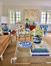 Unknown A Wonderful Mix In This Living Room With Blue And White Chinese Porcelain A Lucite Coffee Table Chinoise Interior Living Room Designs Interior Design