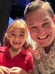 Prayer spotlight grey leads prayer over prayer jar