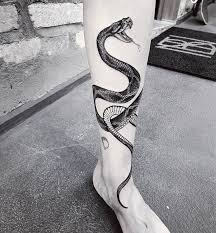Black And White Snake Dream Meaning In Islam Pin By Xxii Xi On Tattoo Snake Tattoo Design Snake Tattoo Tattoos