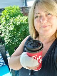 Lifting a mug to those who sent thoughts and prayers