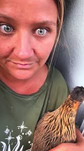 Holding Stella so she's not afraid during fireworks. 💚 #chick #chicke...