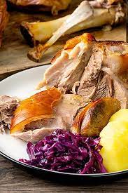 Add the garlic halves on top of the onions, then place the hocks upright on top of. Schweinshaxe German Pork Knuckle Curious Cuisiniere