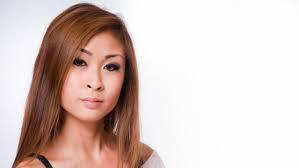 Aspiring model turns herself in to police to face 1st-degree murder charge 