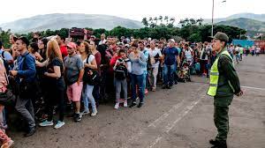 Thousands of venezuelans cross various south american countries on foot. Venezuela Refugee Crisis Overwhelms Colombia We Don T Have The Money Axios