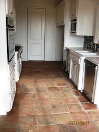 Terra Cotta Tile And White Cabinets Diy House Renovations House Flooring Saltillo Tile