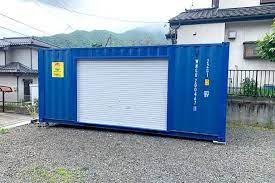 24時間テレビの倉庫利用としてシャッター付きコンテナを設置2 コンテナハウス コンテナ コンテナガレージ