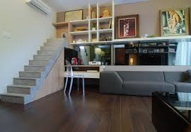 A Stairs Feature Lends A Loft Feel To This Condominium Loft Apartment Furniture Loft Living Loft Apartment Designs