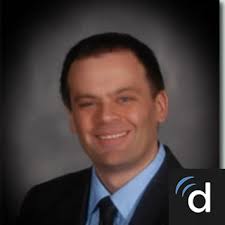 Dr. Garrett Vick, MD