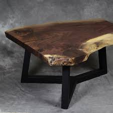 Live edge wood top coffee table set on black metal legs. Walnut Live Edge Coffee Table Y Leg Anglewood Live Edge Custom Furniture Toronto